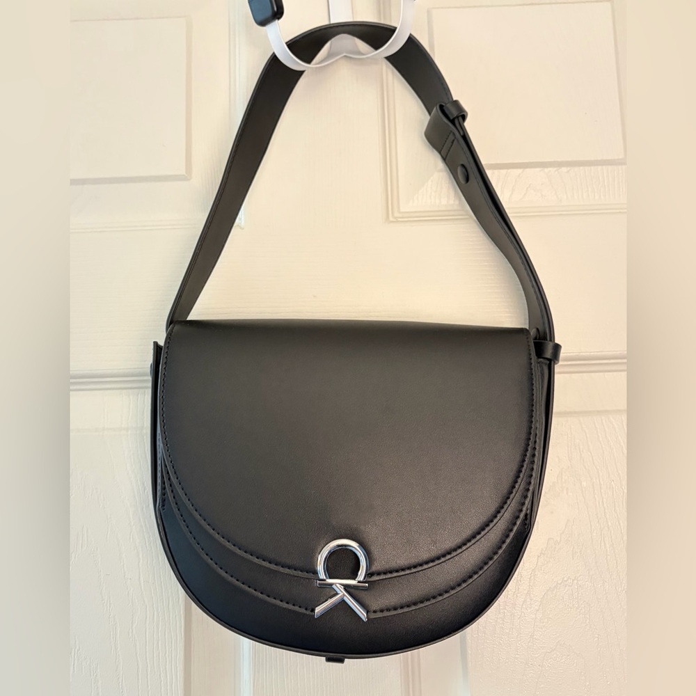 Calvin Klein Black adjustable Shoulder purse/bag with Silver Accent